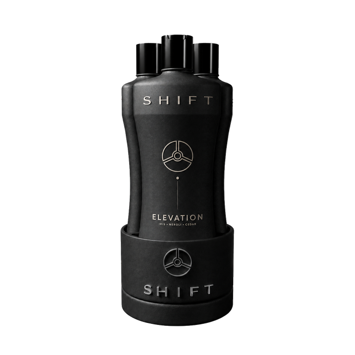 Three Elevation bottles grouped inside a SHIFT Base